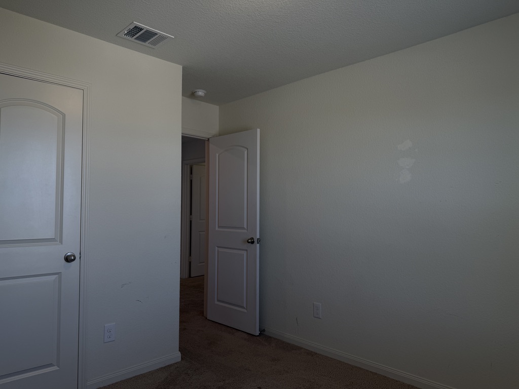 709 Yearwood Lane, Unit 48E Jarrell, TX 76537 - Photo 28 of 39 a view of closet area
