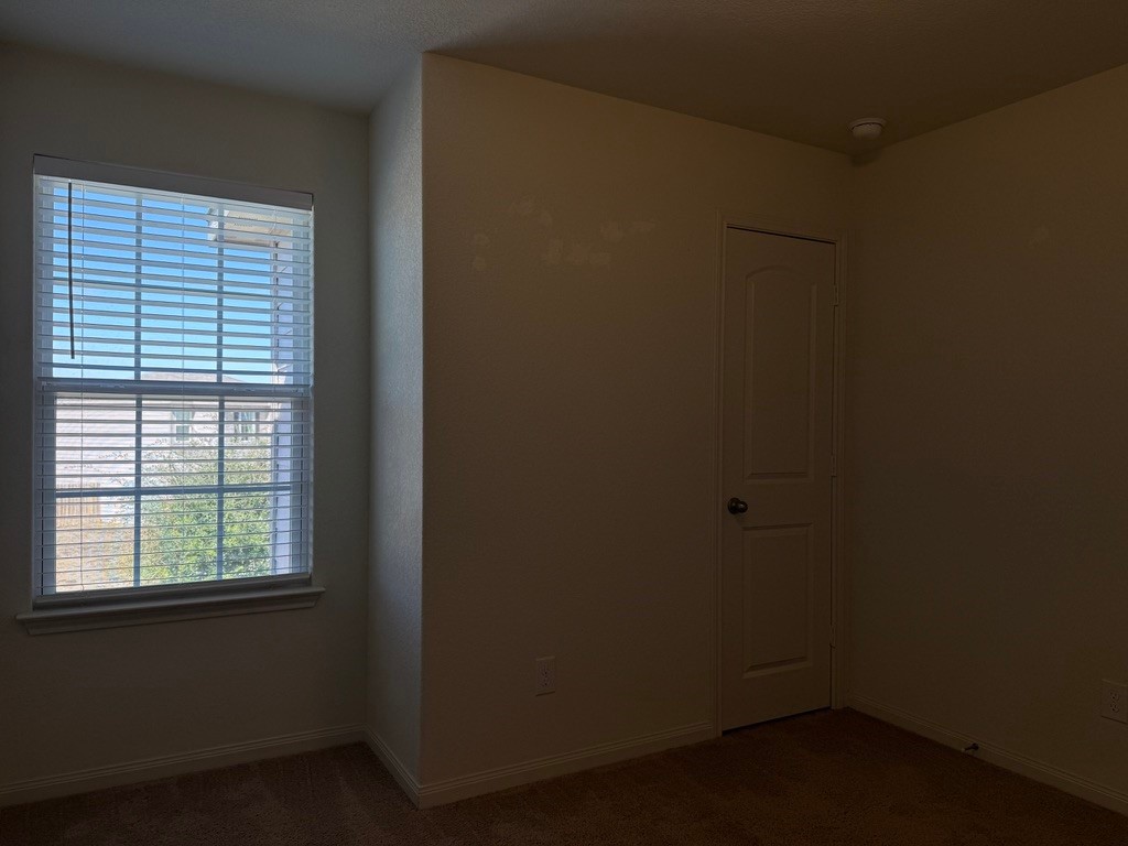 709 Yearwood Lane, Unit 48E Jarrell, TX 76537 - Photo 29 of 39 a small space with a window
