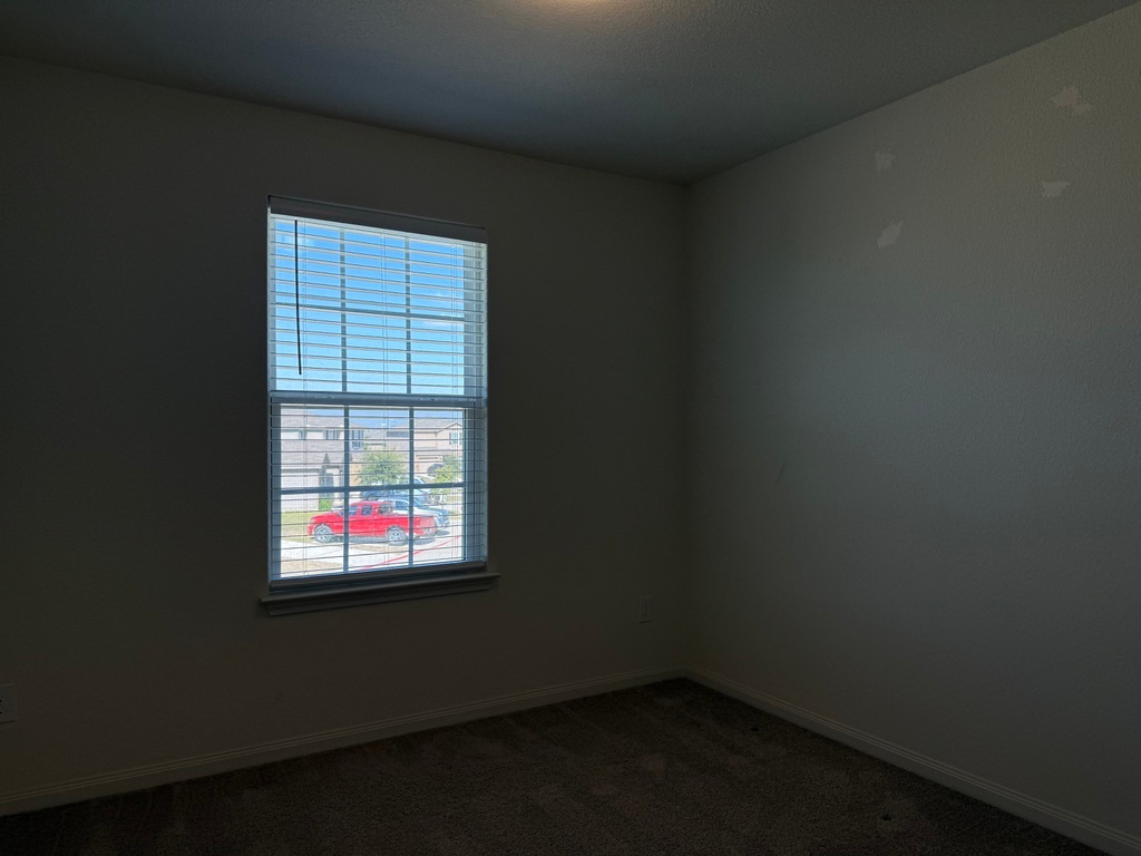 709 Yearwood Lane, Unit 48E Jarrell, TX 76537 - Photo 31 of 39 a small space with a window