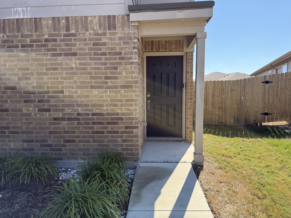 709 Yearwood Lane, Unit 48E Jarrell, TX 76537 - Photo 4 of 39 a view of door with an outdoor space