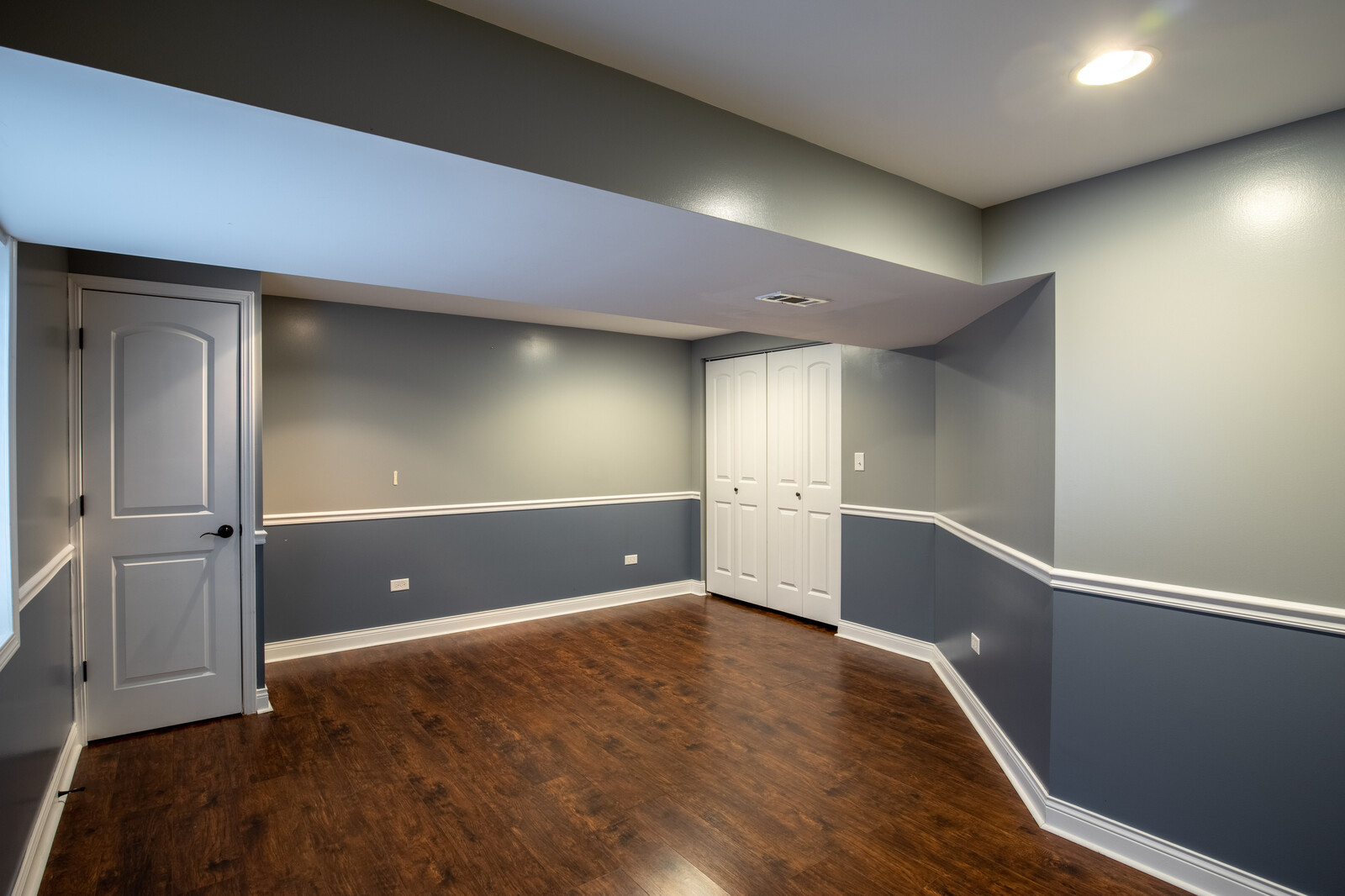 2101 Silverleaf Court Addison, IL 60101 - Photo 26 of 41 wooden floor and cabinet in an empty room