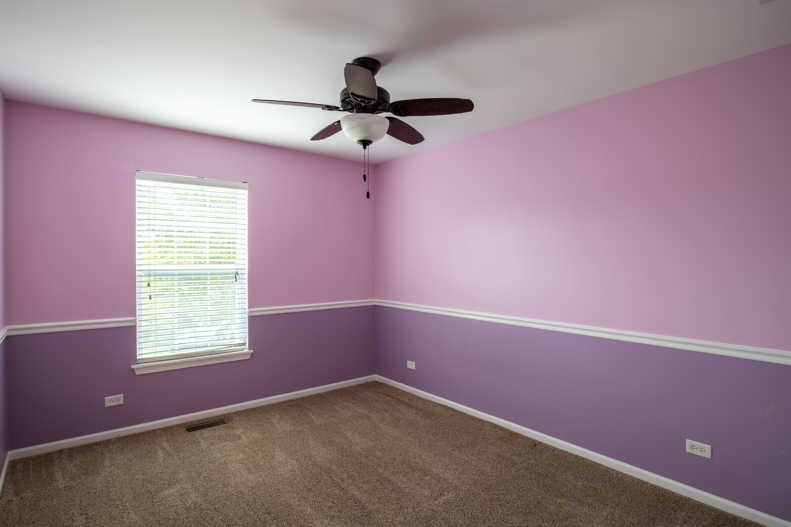 2101 Silverleaf Court Addison, IL 60101 - Photo 40 of 41 an empty room with a window and a fan