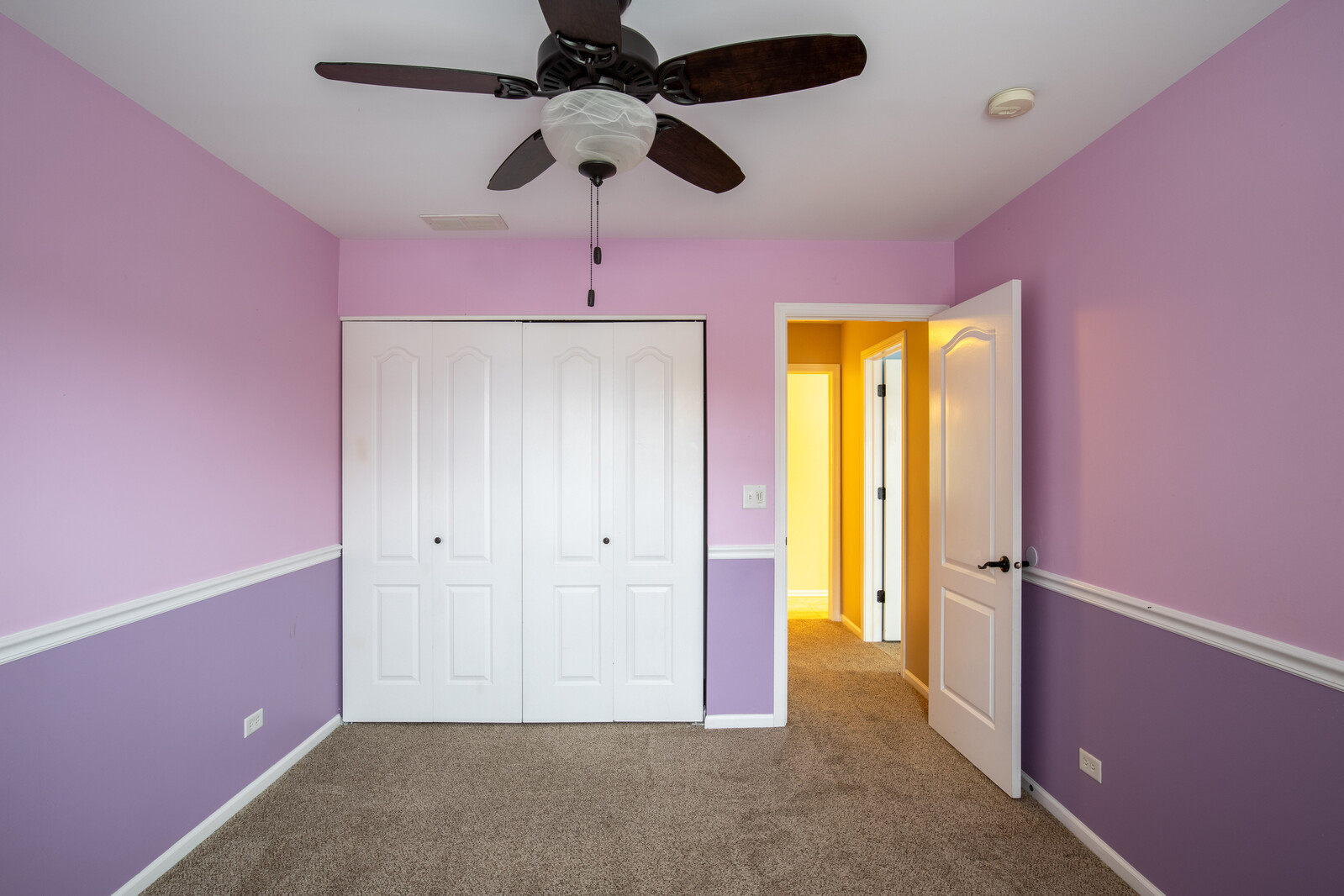 2101 Silverleaf Court Addison, IL 60101 - Photo 41 of 41 an empty room with a ceiling fan and a window
