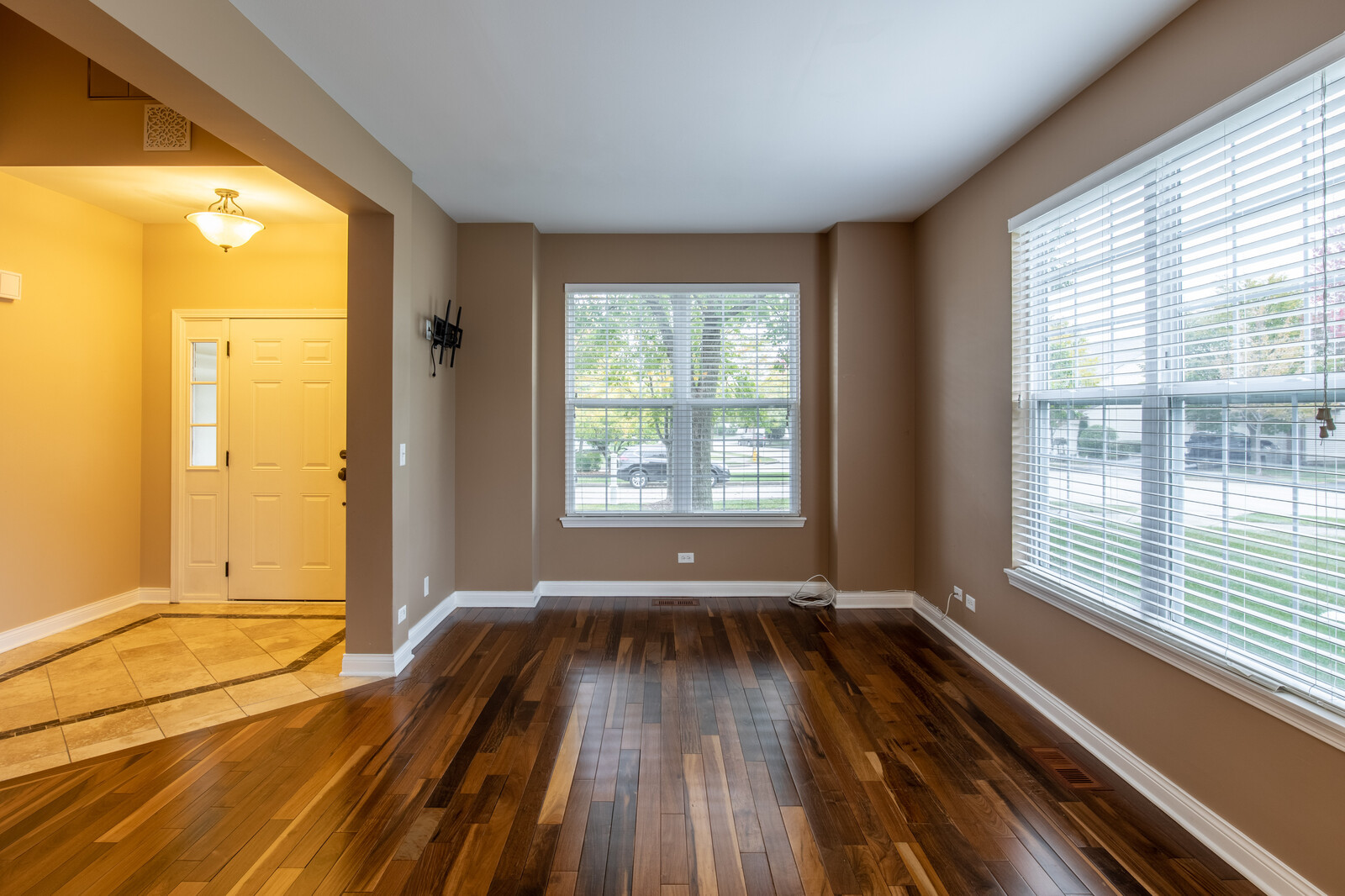 2101 Silverleaf Court Addison, IL 60101 - Photo 6 of 41 a view of wooden floor in an empty room with a window