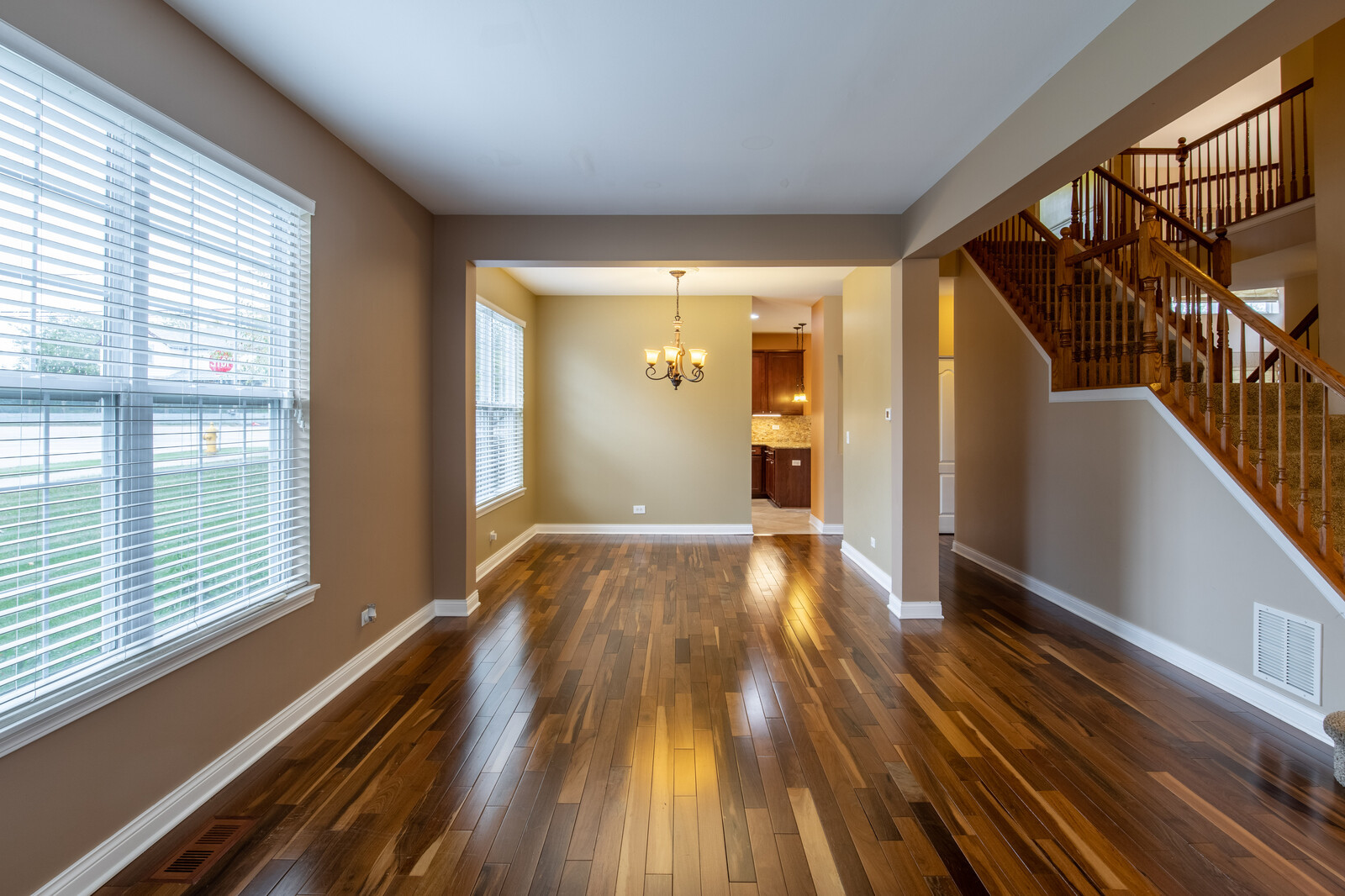 2101 Silverleaf Court Addison, IL 60101 - Photo 8 of 41 a view of hallway with wooden floor and stairs