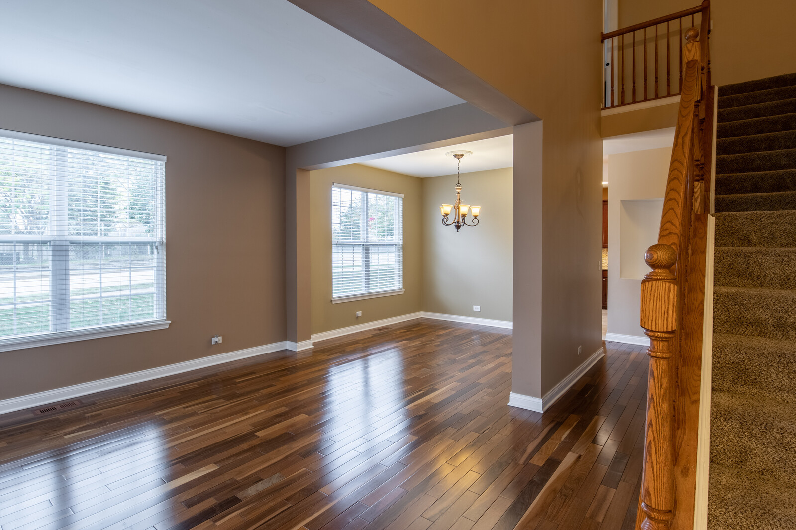 2101 Silverleaf Court Addison, IL 60101 - Photo 9 of 41 a view of an empty room with wooden floor and a window