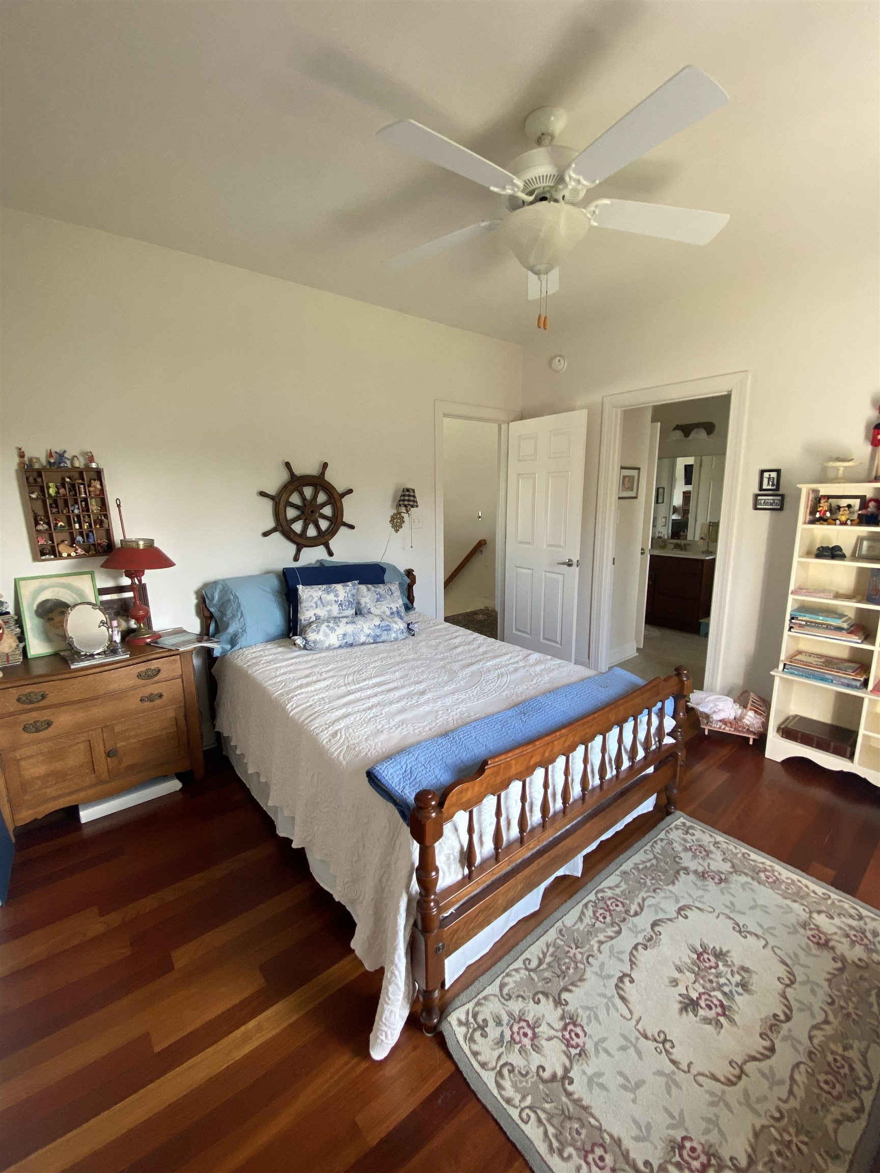 2750 Spring Hill Road Staunton, VA 24401 - Photo 54 of 68 a bedroom with a bed a table and wooden floor