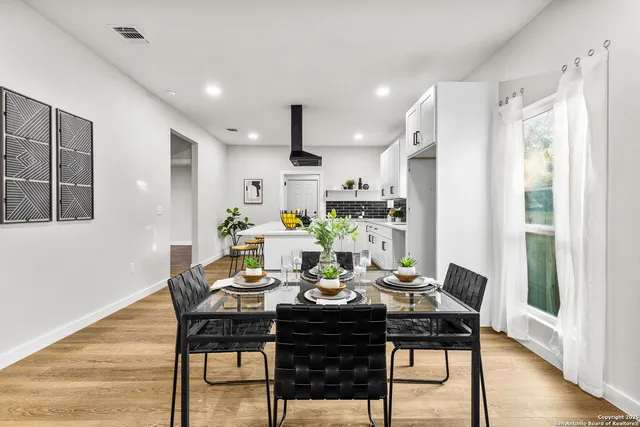 a view of a dining room with furniture
