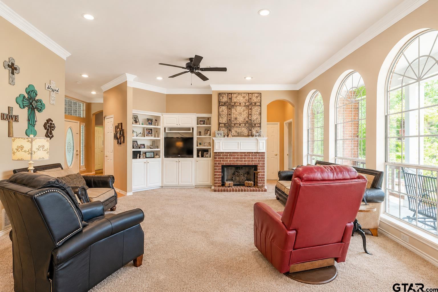 1388 Santa Fe Trail Tyler, TX 75703 - Photo 12 of 46 a living room with furniture and a fireplace