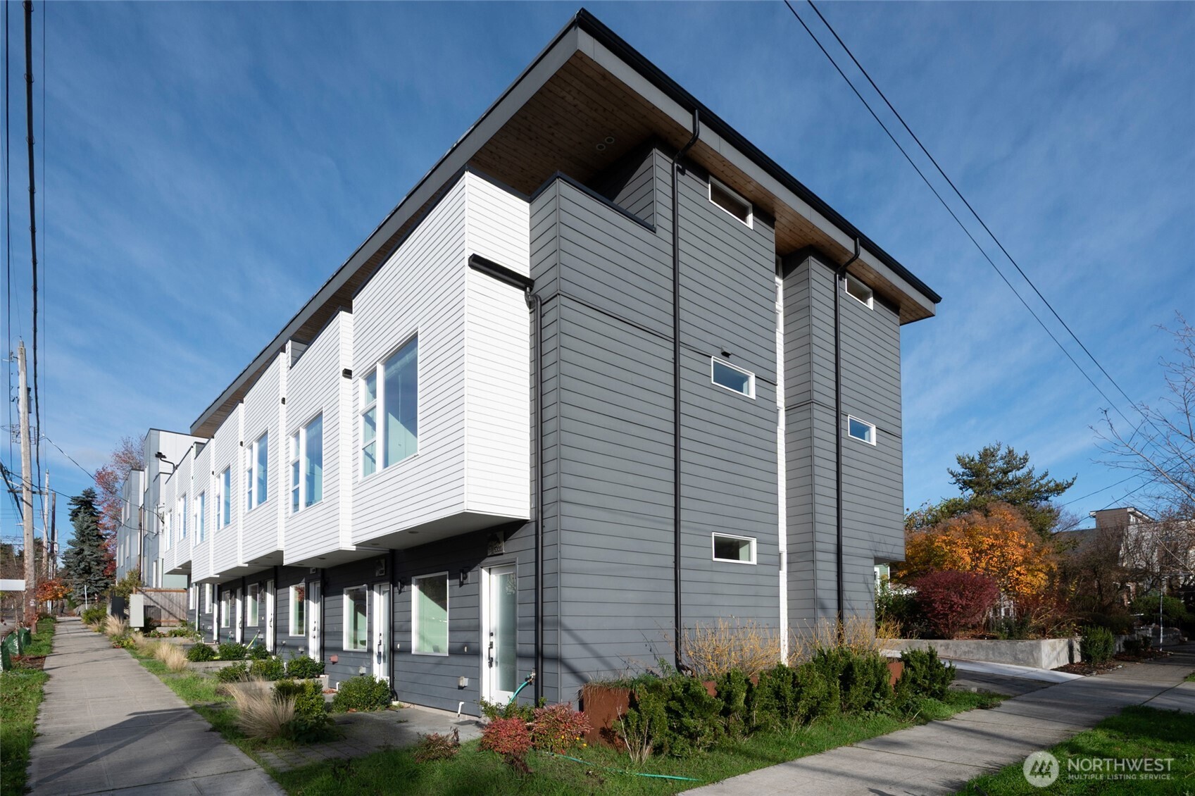 a front view of building with garden