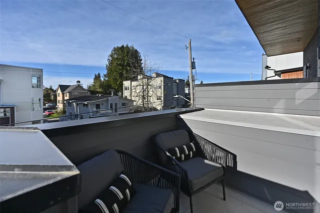 a kitchen with a table chairs and a stove