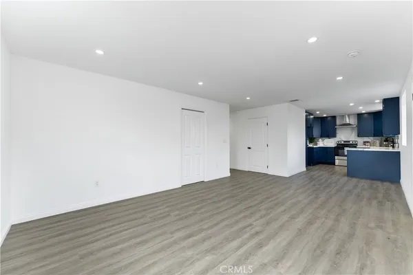 a view of kitchen with wooden floor