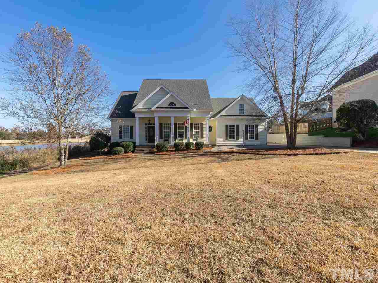 326 Challenge Road Raleigh, NC 27603 - Photo 1 of 30 a front view of a building with a yard