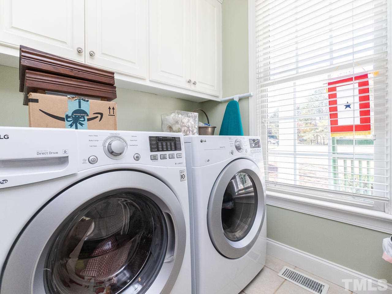 326 Challenge Road Raleigh, NC 27603 - Photo 14 of 30 a utility room with dryer and washer