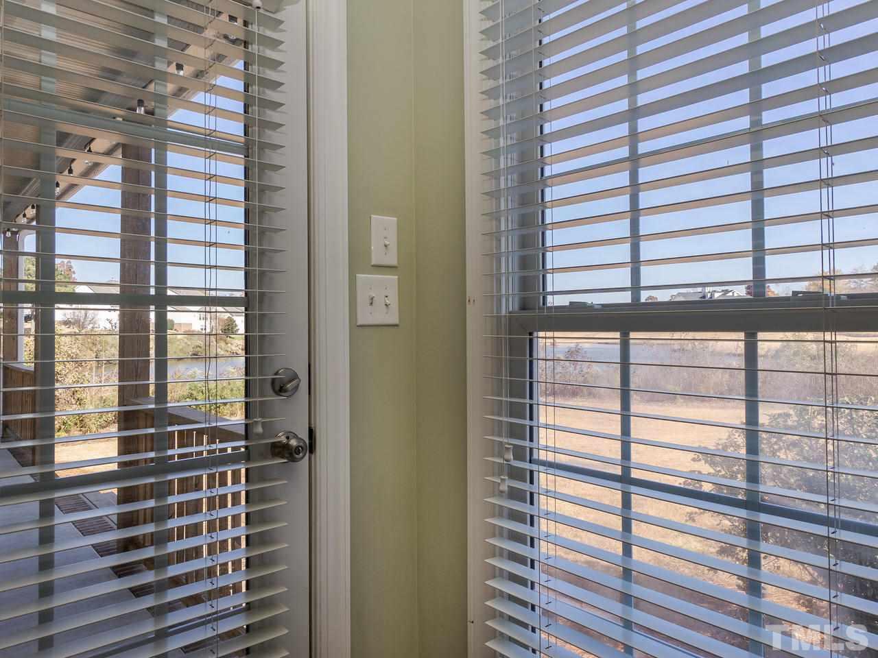 326 Challenge Road Raleigh, NC 27603 - Photo 17 of 30 a view of a balcony and window