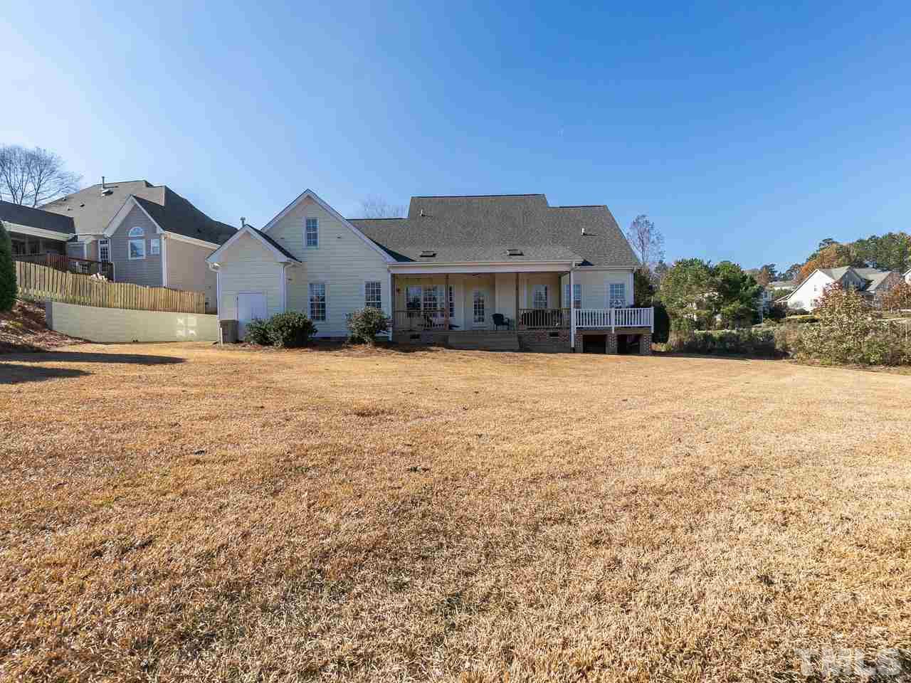 326 Challenge Road Raleigh, NC 27603 - Photo 27 of 30 a view of a house with a yard