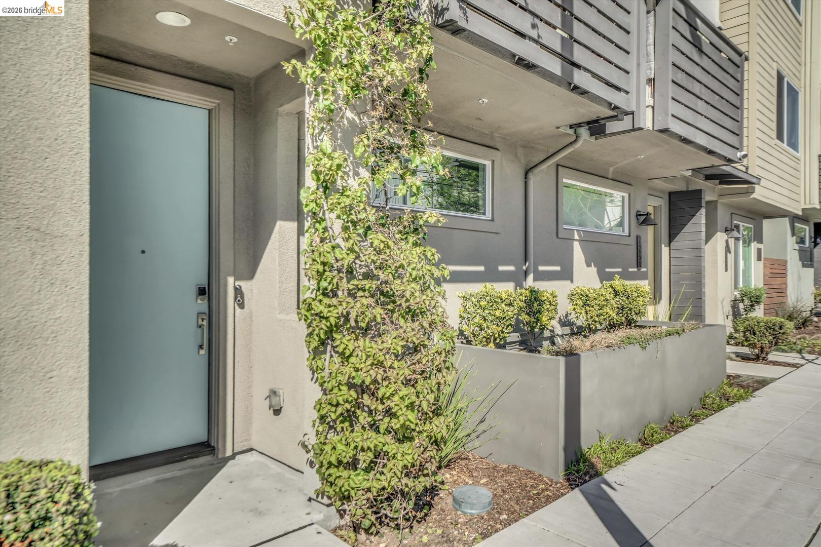 2229 Myrtle Street Oakland, CA 94607 - Photo 30 of 37 view of exterior entry featuring stucco siding