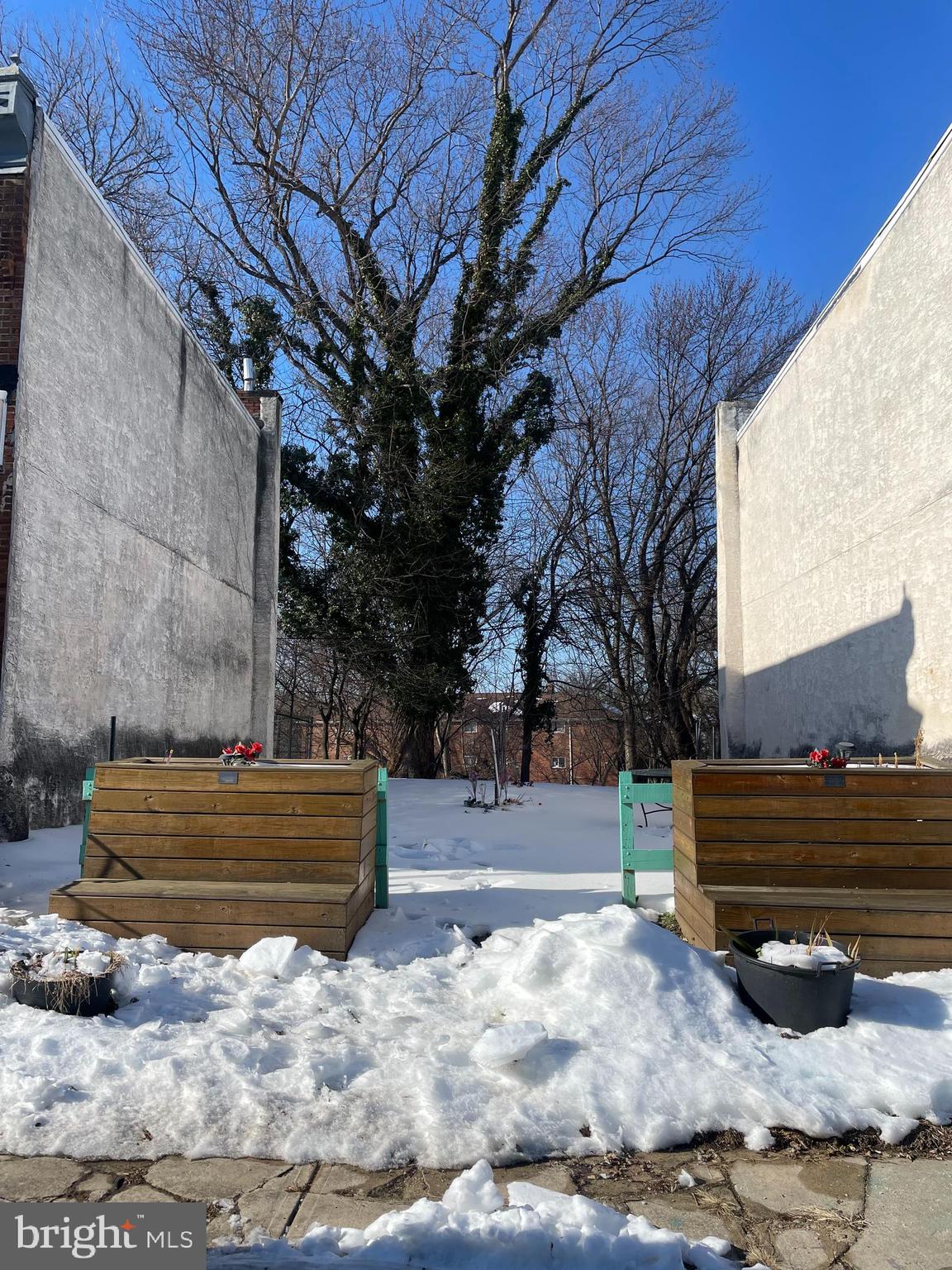 6031 Trinity Street Philadelphia, PA 19142 - Photo 2 of 2 a view of backyard with wooden fence