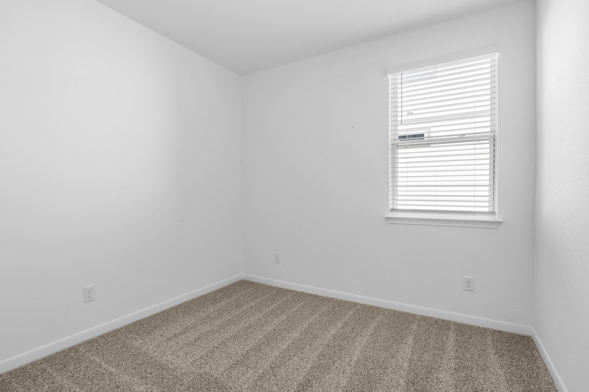 305 Brooks Ranch Drive Kyle, TX 78640 - Photo 28 of 32 an empty room with a window
