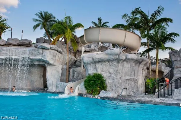 a house with palm tree in front of it