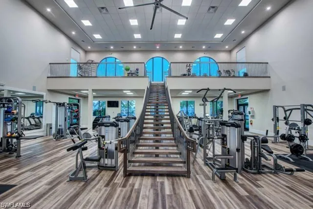 a view of a room with lots of wooden furniture
