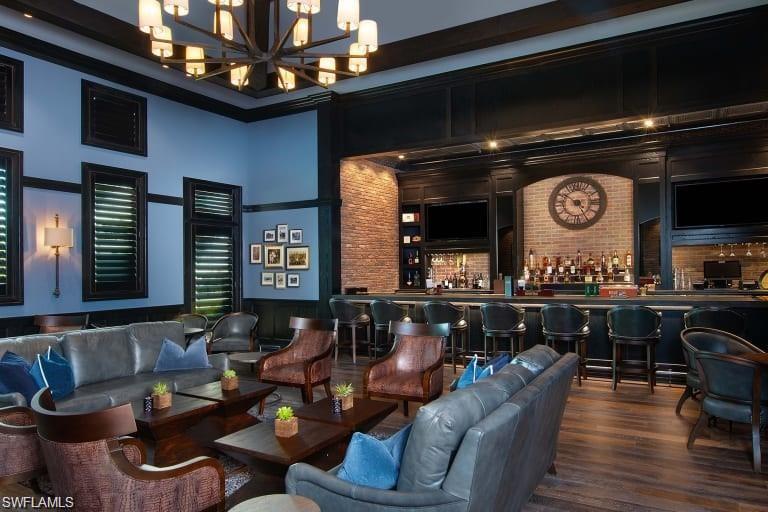 19824 Beechcrest Place Estero, FL 33928 - Photo 24 of 26 a living room filled with furniture