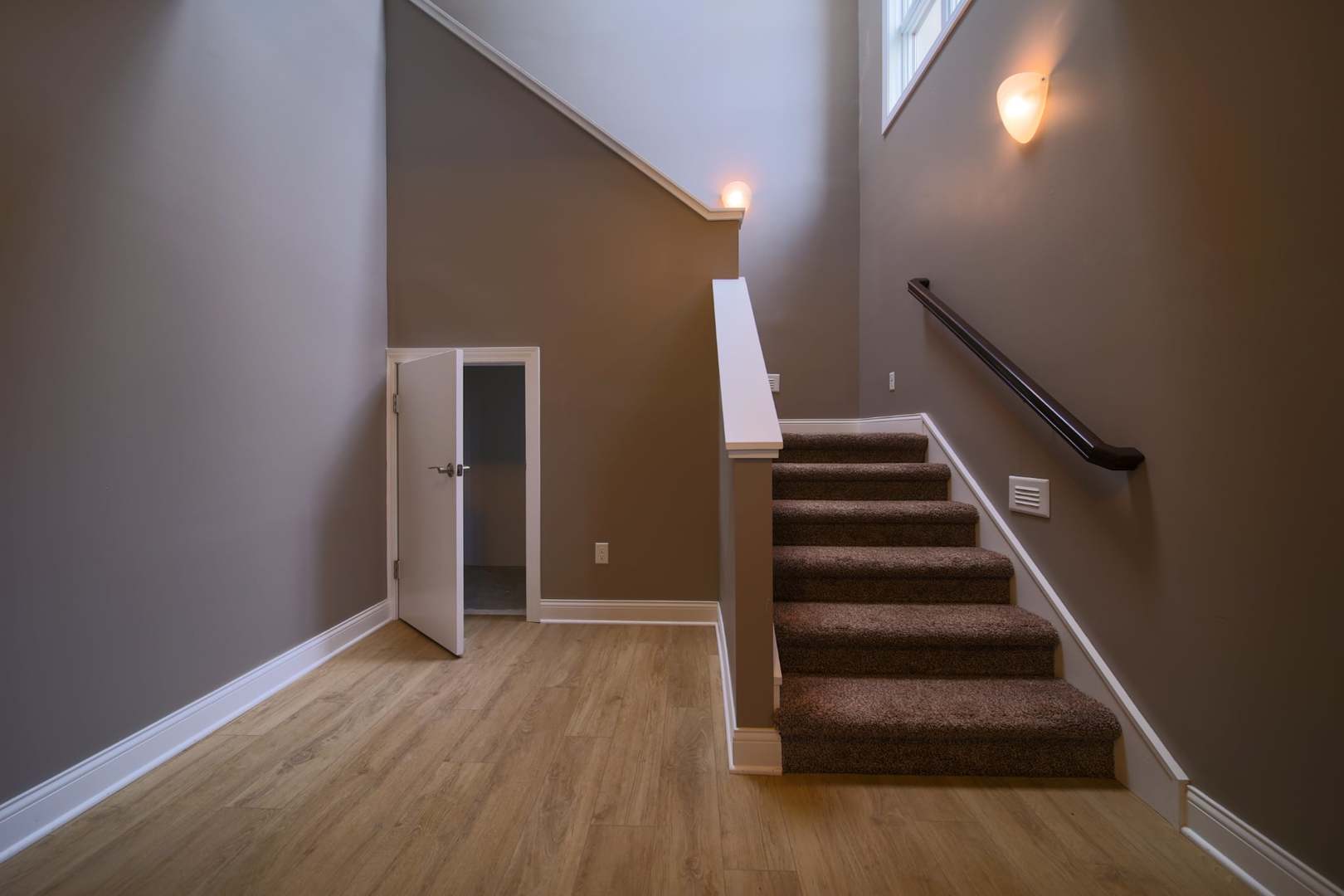 4935 Utica Ridge Road, Unit 220 Davenport, IA 52807 - Photo 13 of 29 a view of entryway and hall with wooden floor