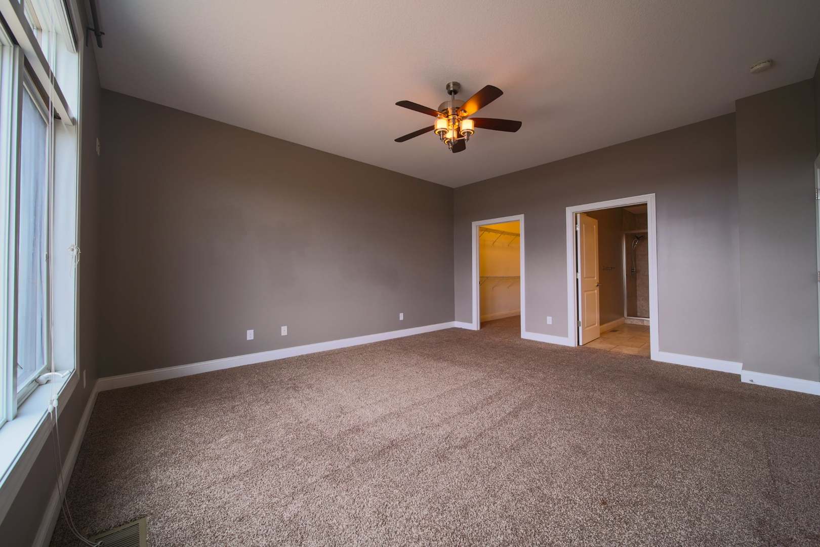 4935 Utica Ridge Road, Unit 220 Davenport, IA 52807 - Photo 14 of 29 a view of an empty room with a window