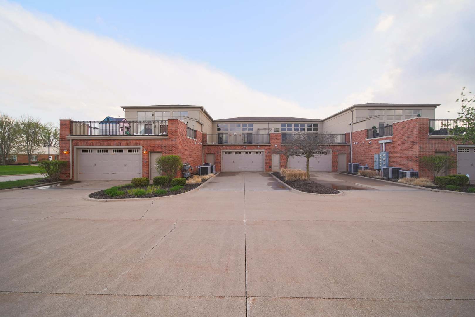 4935 Utica Ridge Road, Unit 220 Davenport, IA 52807 - Photo 3 of 29 a view of a city with tall buildings