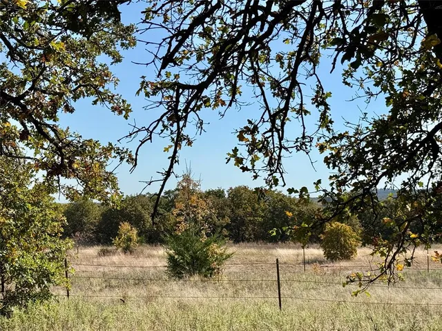 a view of snow on top of a road