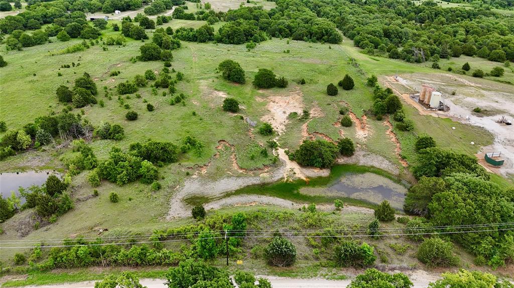 2753 Big Tree Road Montague, TX 76251 - Photo 2 of 40 an aerial view of residential house with outdoor space