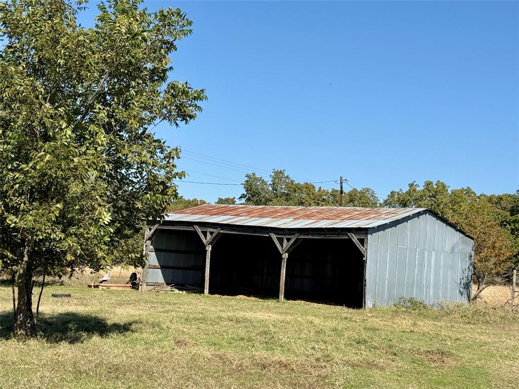 2753 Big Tree Road Montague, TX 76251 - Photo 22 of 40 a view of a house with a yard