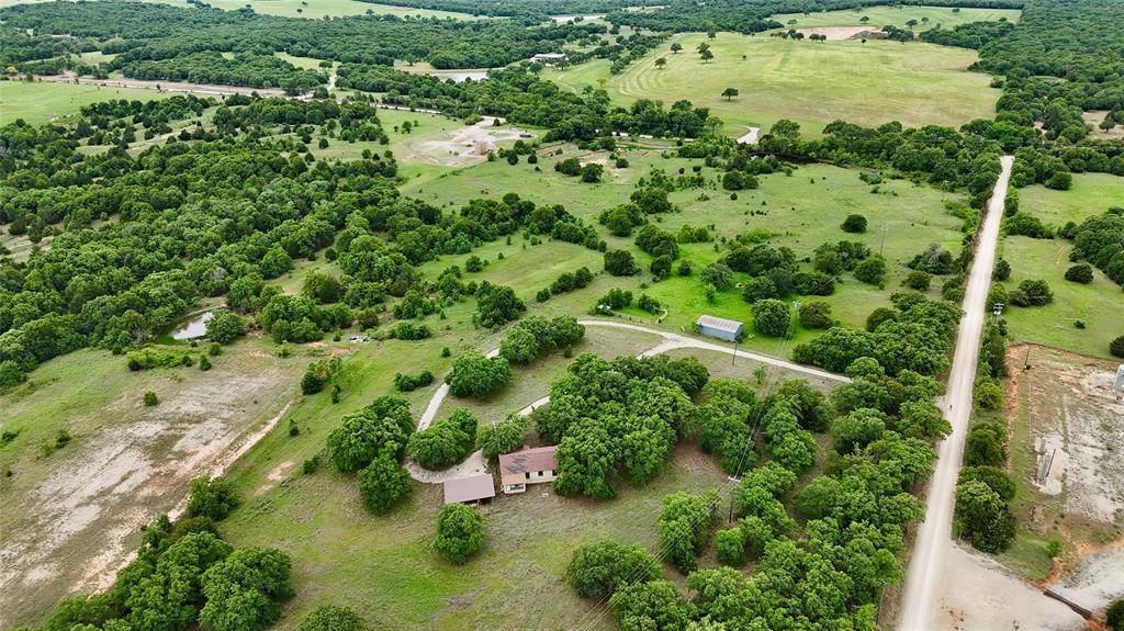 2753 Big Tree Road Montague, TX 76251 - Photo 37 of 40 an aerial view of residential house with green space