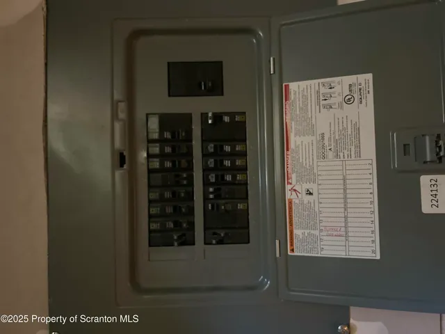 a view of a refrigerator in a kitchen