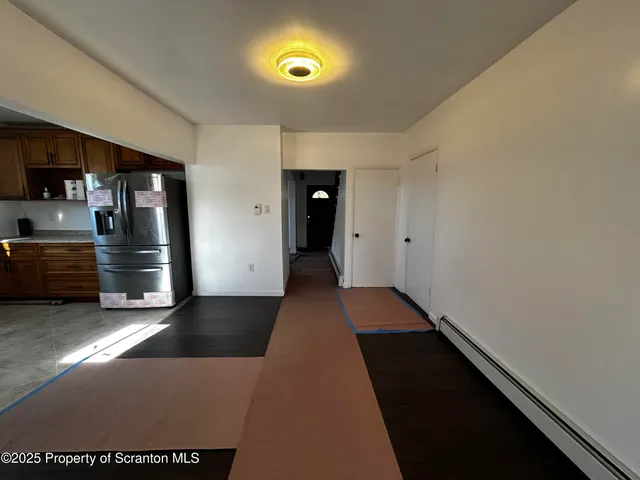 a view of entryway with stairs