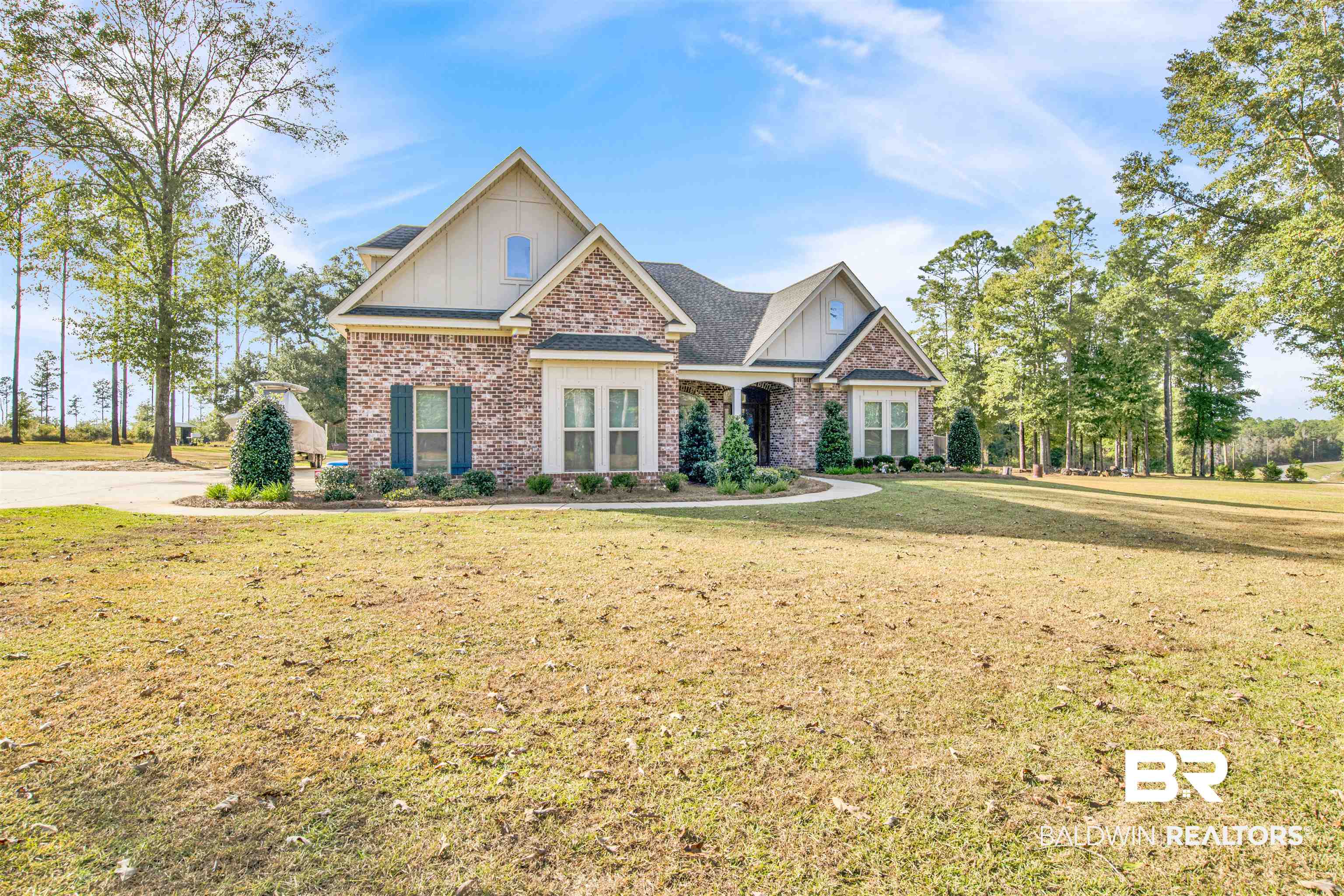 2440 Johnson Road West Mobile, AL 36695 - Photo 3 of 40 Craftsman inspired home featuring a front lawn