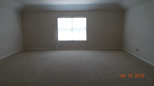 an empty room with a window