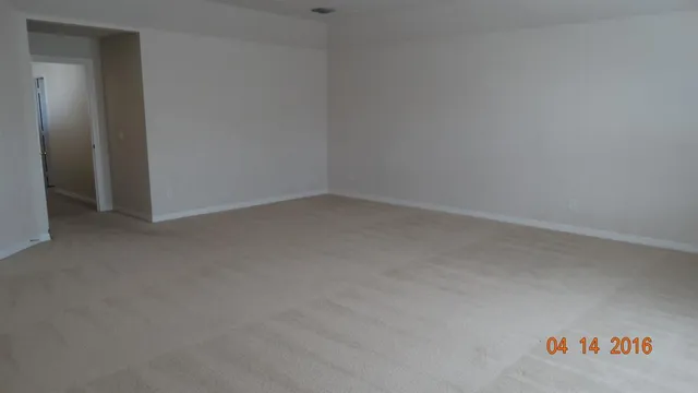 a view of an entryway and a hallway