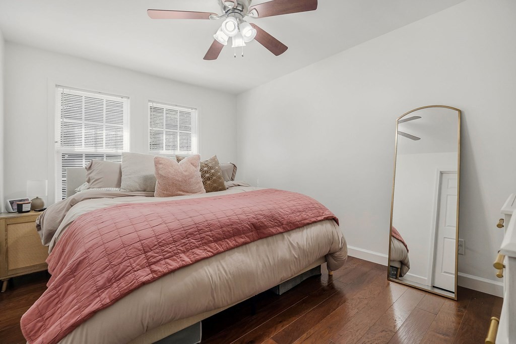 330 Flatt Street Sparta, TN 38583 - Photo 16 of 24 a bedroom with a bed and wooden floor