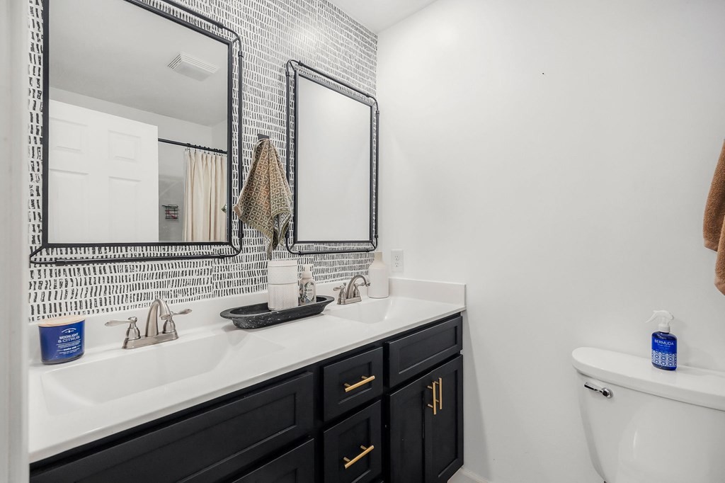 330 Flatt Street Sparta, TN 38583 - Photo 18 of 24 a bathroom with a sink and a mirror