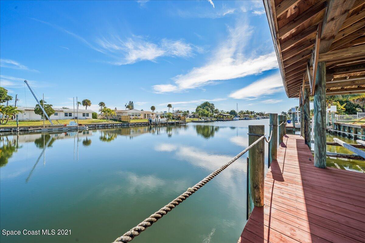 105 La Riviere Road Cocoa Beach, FL 32931 - Photo 11 of 21 Canal from dock