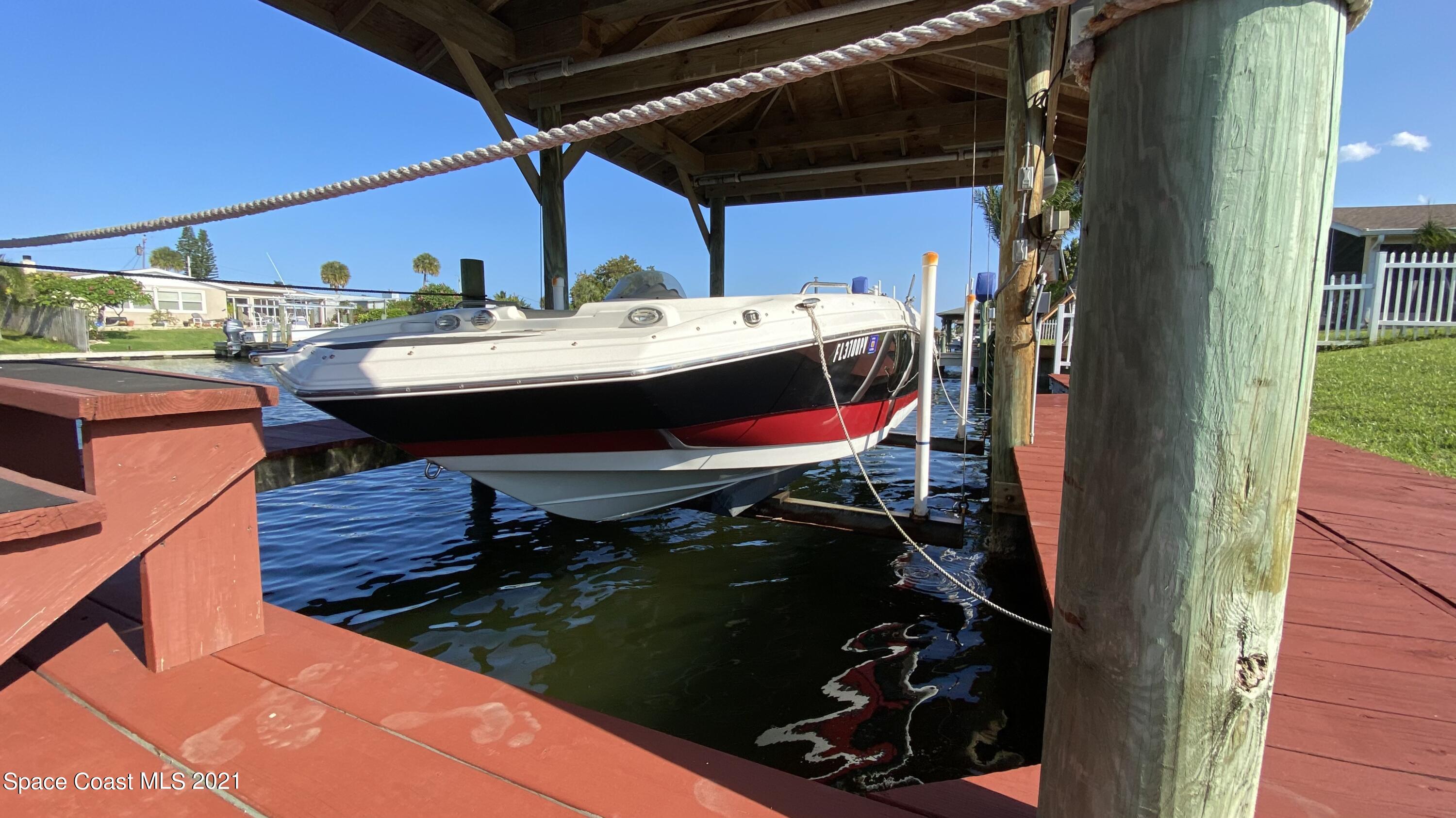 105 La Riviere Road Cocoa Beach, FL 32931 - Photo 12 of 21 Boat lift (Vessel does not convey)