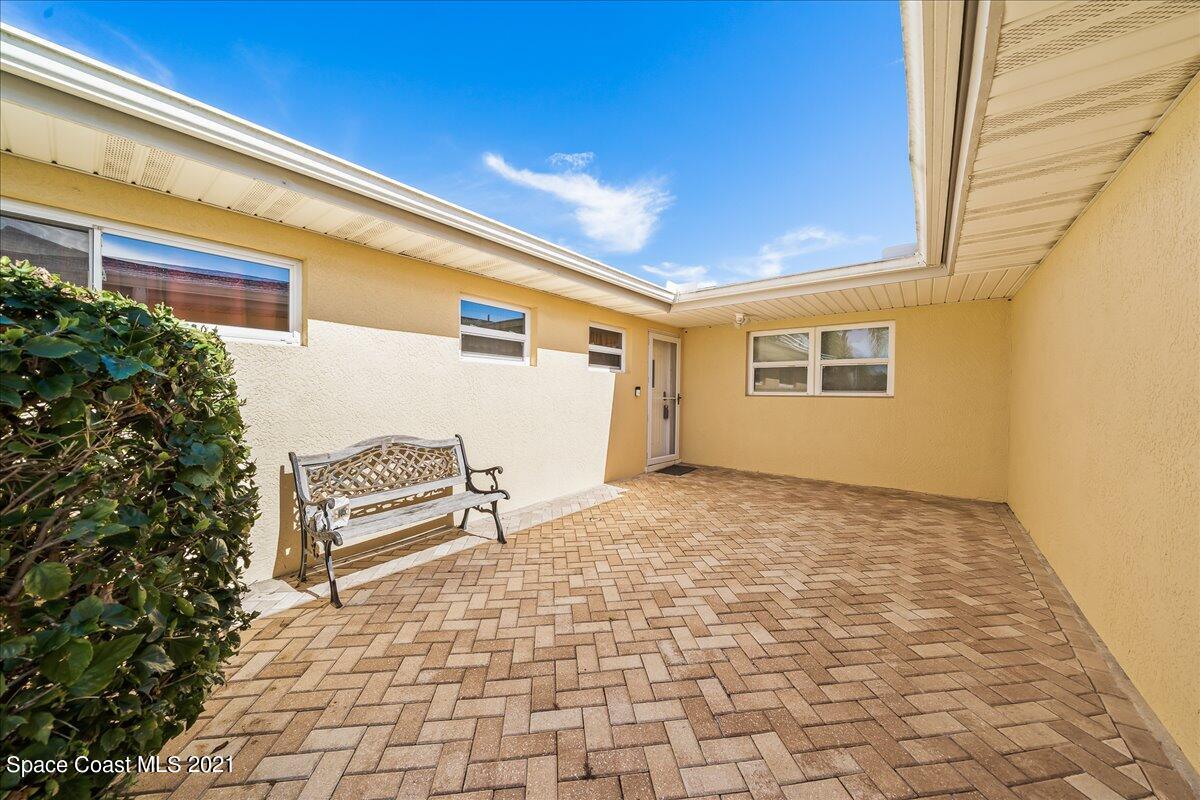 105 La Riviere Road Cocoa Beach, FL 32931 - Photo 6 of 21 Courtyard entry