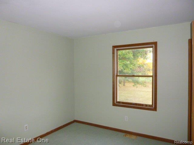 7907 Pingree Road Pinckney, MI 48169 - Photo 9 of 26 264-041382 Bedroom 2.jpg
