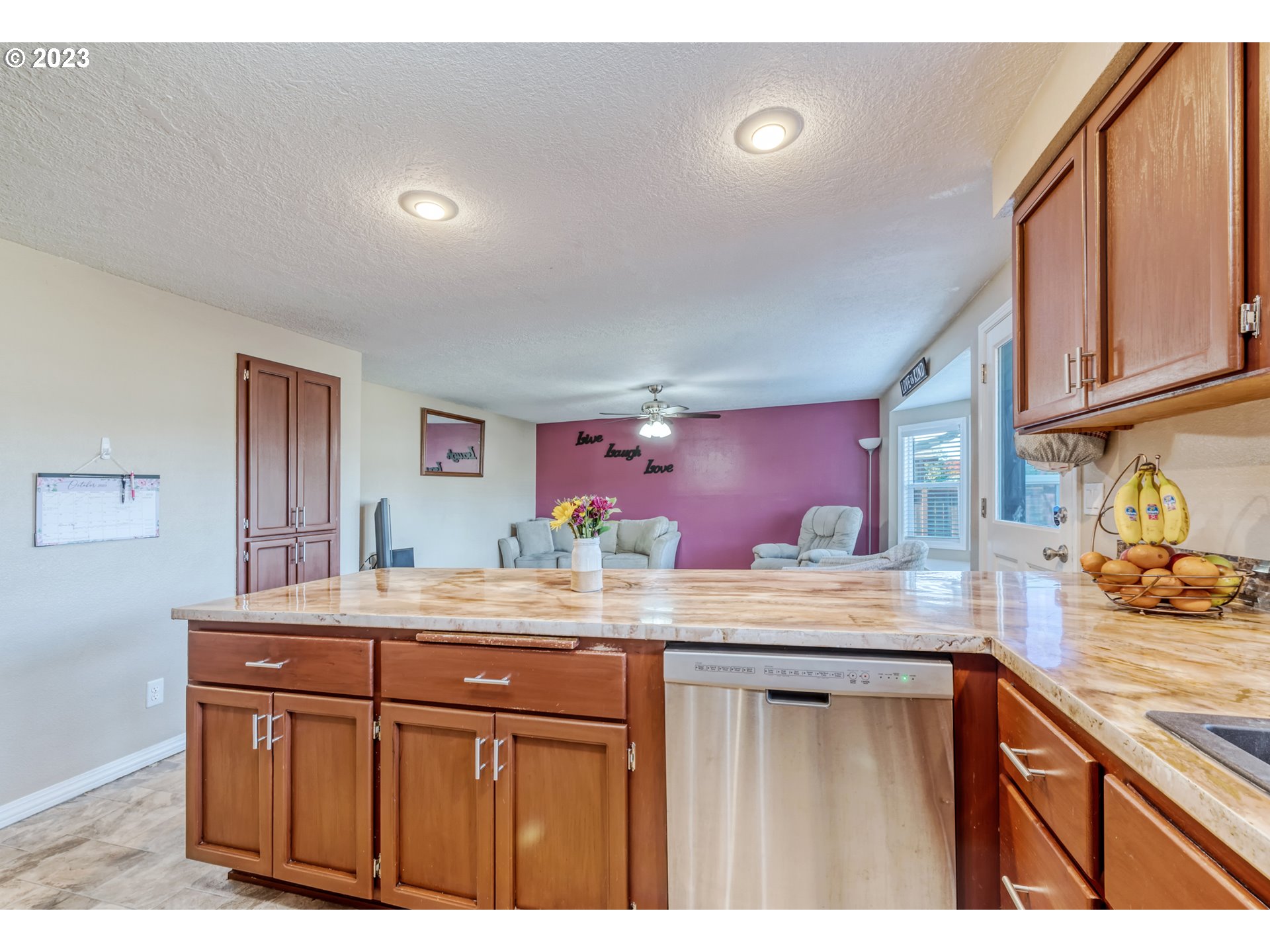 7370 B Street Springfield, OR 97478 - Photo 14 of 41 a kitchen with a sink a counter space and cabinets