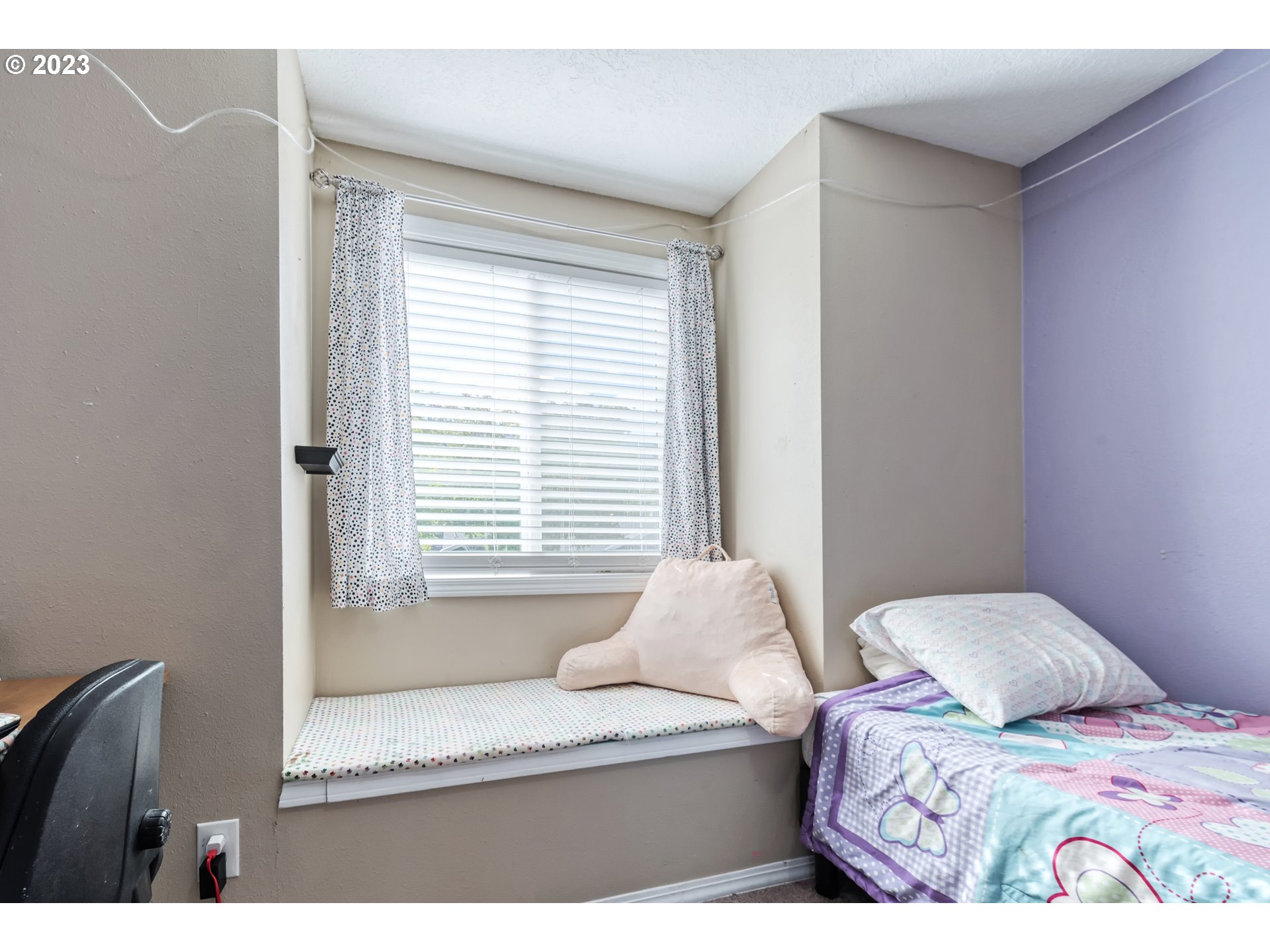 7370 B Street Springfield, OR 97478 - Photo 27 of 41 a bedroom with a bed and a window