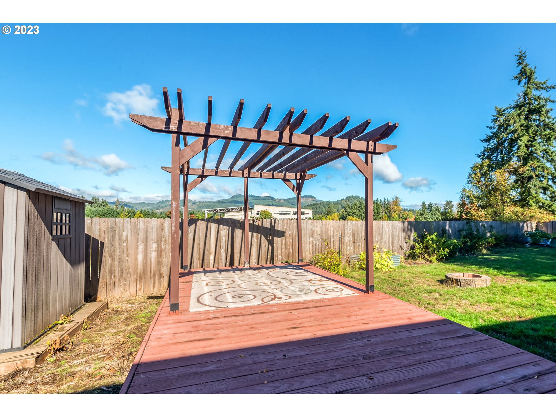 7370 B Street Springfield, OR 97478 - Photo 33 of 41 a view of a backyard with a patio