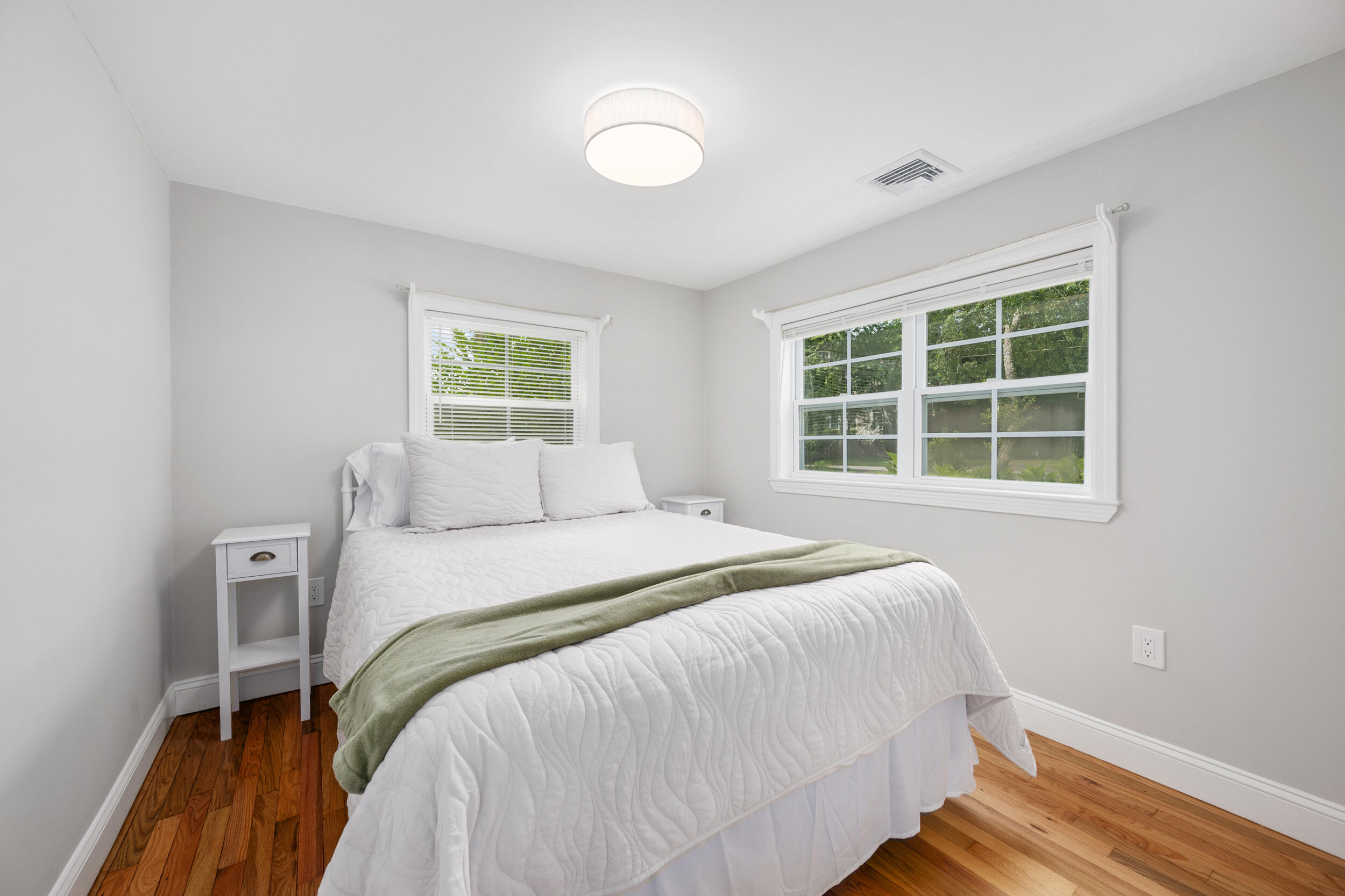 40 Red Lily Pond Road Centerville, MA 02632 - Photo 12 of 25 a bedroom with a bed and a window