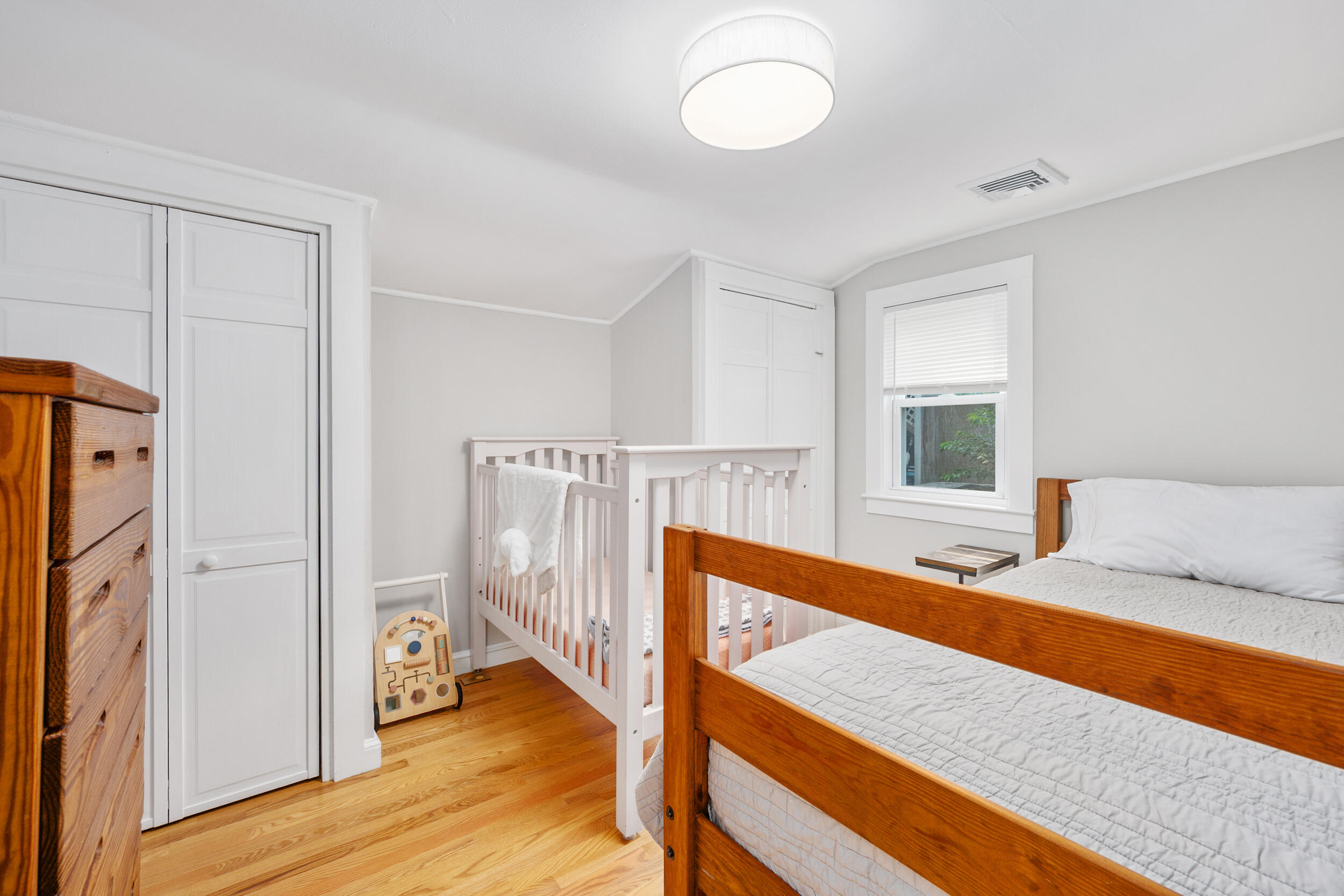 40 Red Lily Pond Road Centerville, MA 02632 - Photo 15 of 25 a view of an empty room and wooden floor