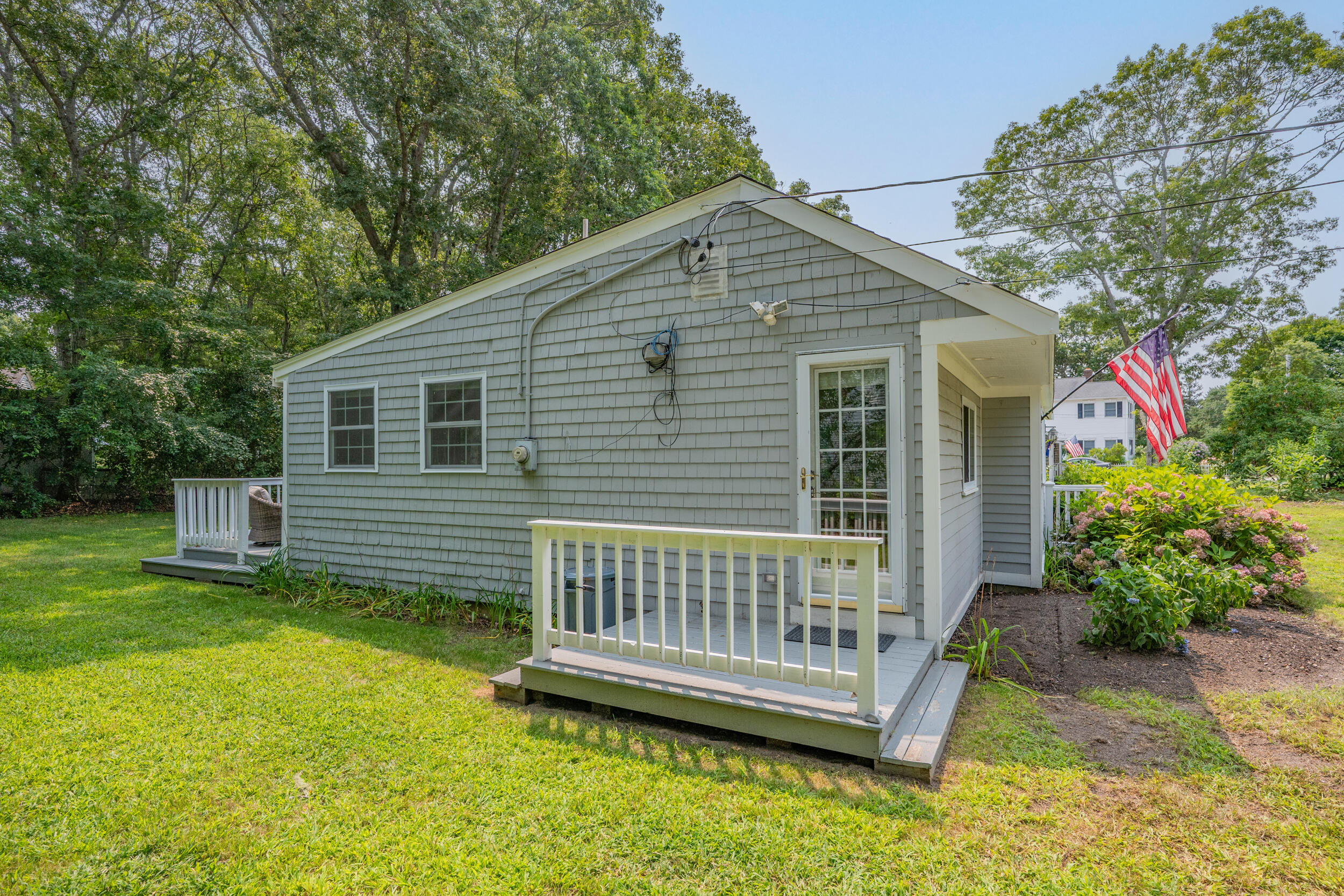 40 Red Lily Pond Road Centerville, MA 02632 - Photo 17 of 25 a view of a house with a yard